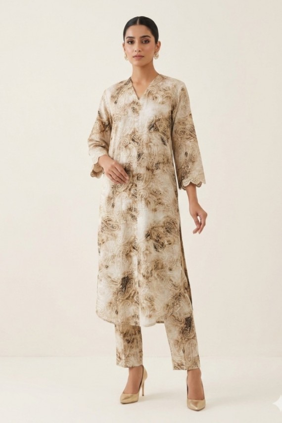 Beige and white printed cotton 2pc suit. 